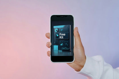 Hand holding a smartphone with a 'Free Kit' app displayed on a gradient background